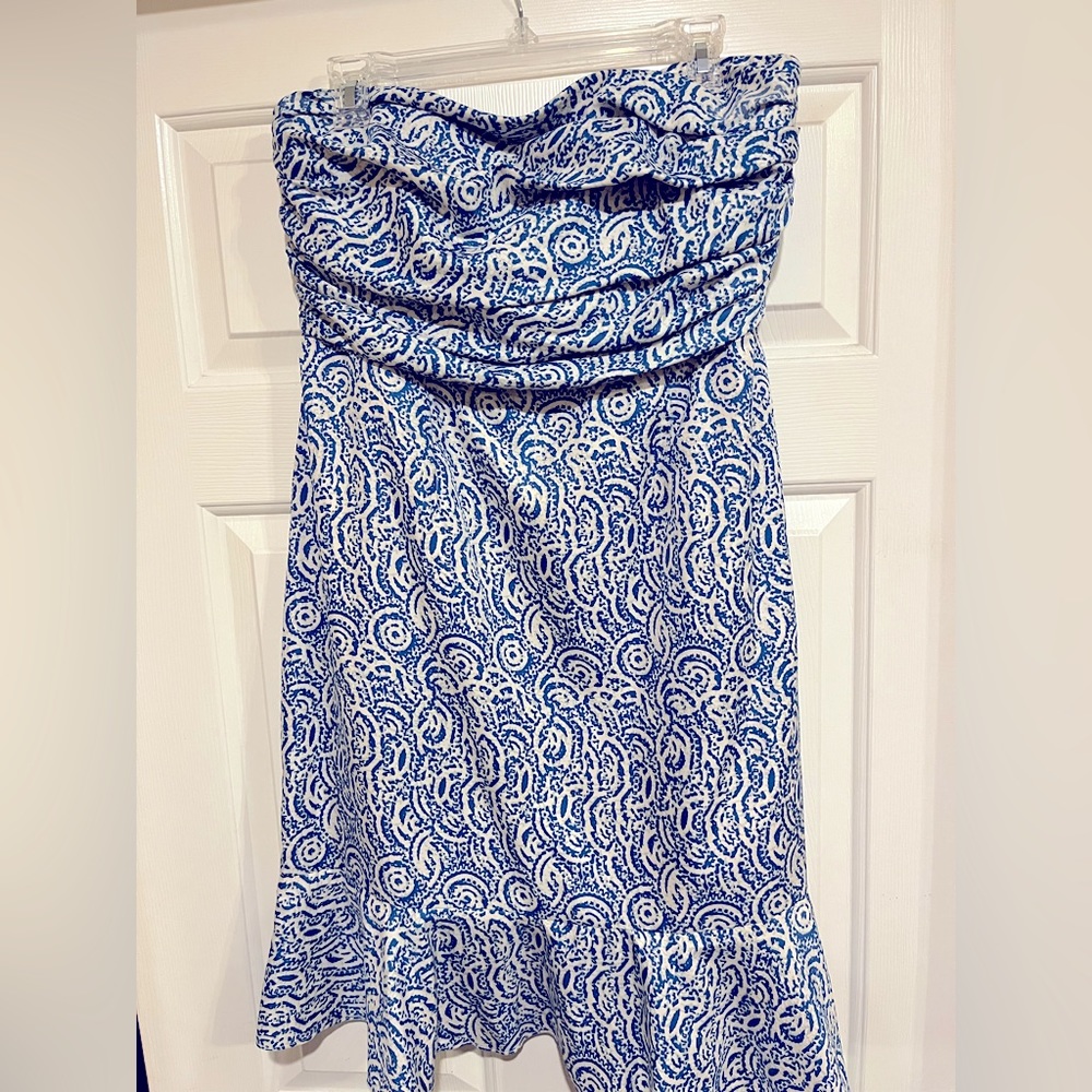 Limited strapless ruffle bottom dress